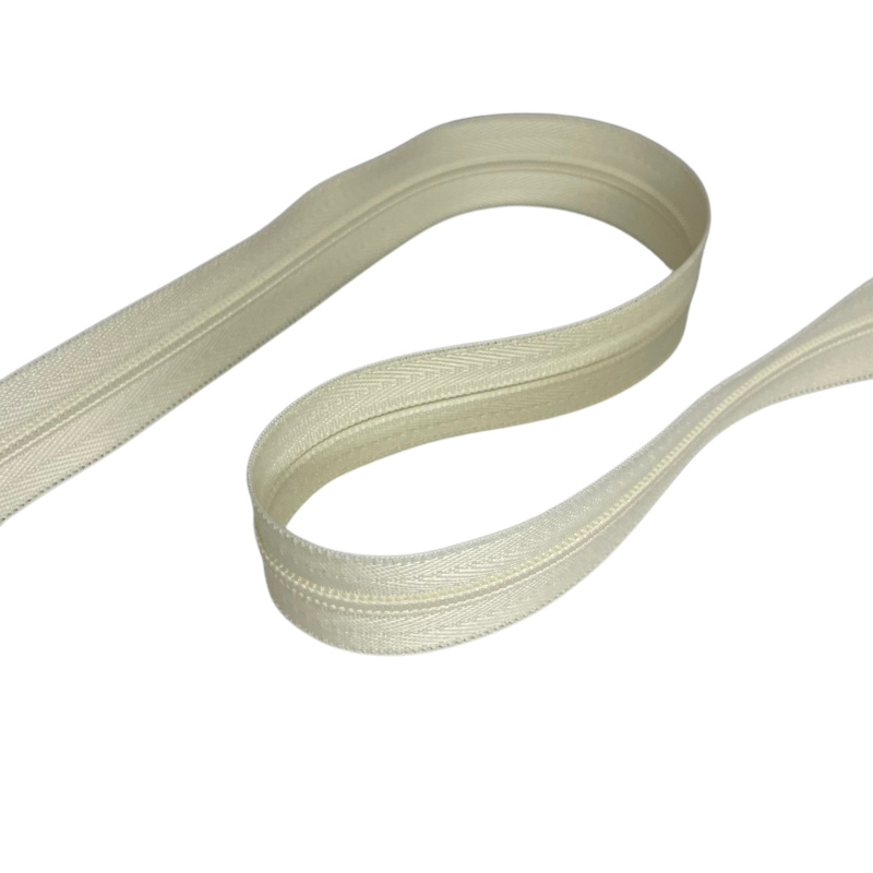 Spirálový zip 3mm-SMETANOVÁ po 25m